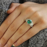 JB Star round emerald and round diamond ring