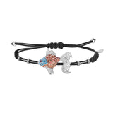 Pippo Perez diamond and sapphire carp bracelet on a black nautical, adjustable cord