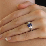 Cushion cut Sapphire and Diamond Three-stone Ring