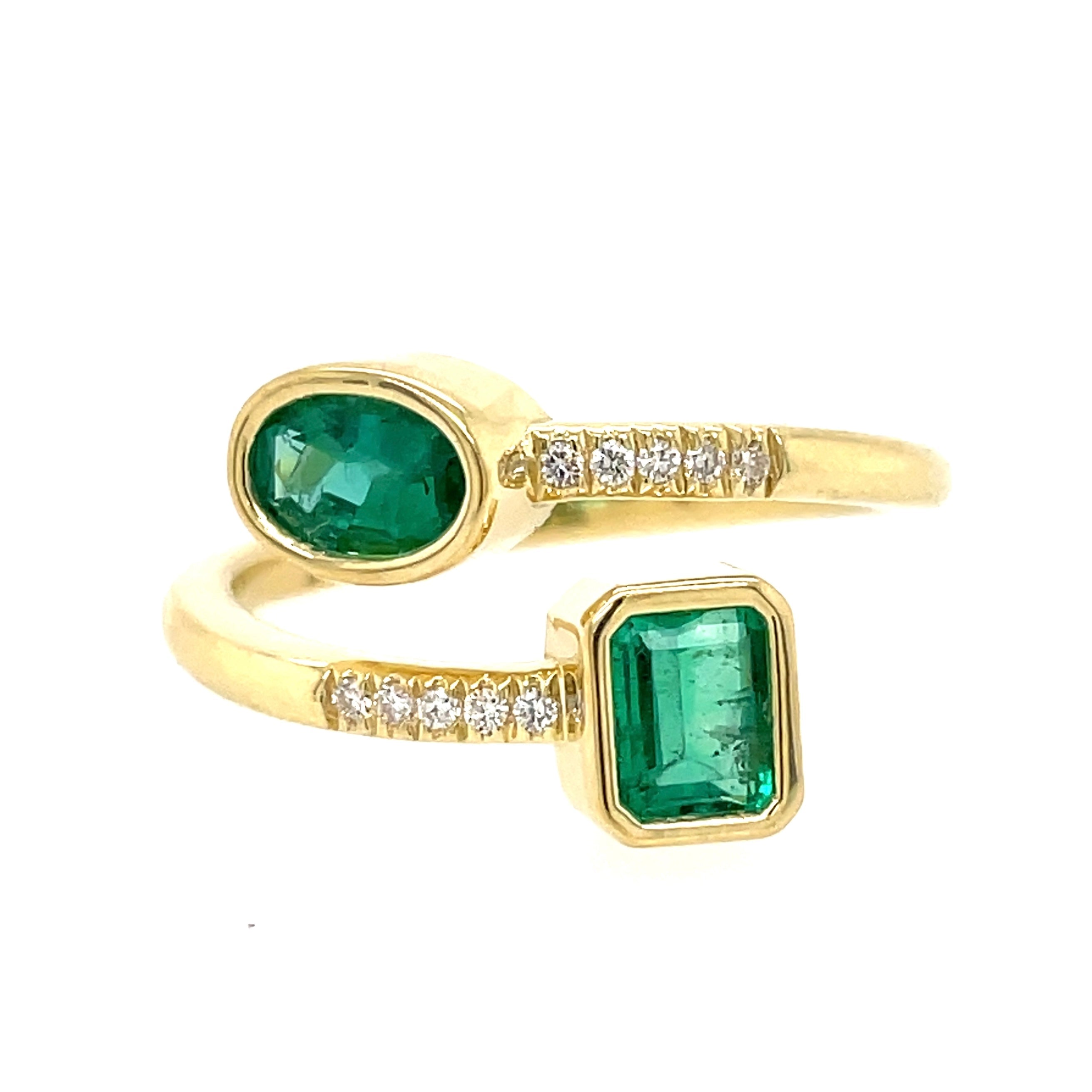 Lauren K oval and rectangular emerald cut emerald bypass ring - Be On Park